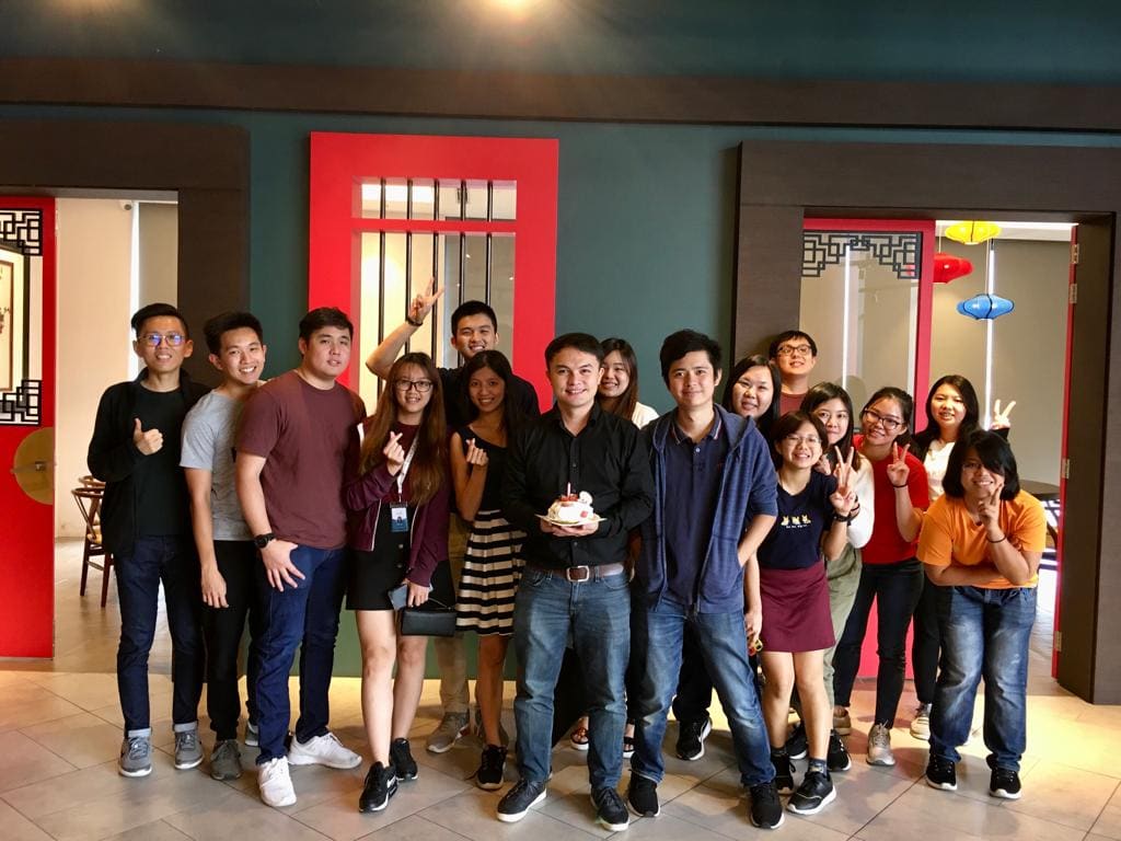Agmoians celebrating together at the office